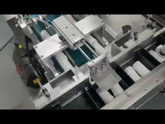 Машина для картонирования небольших бутылок типа 120